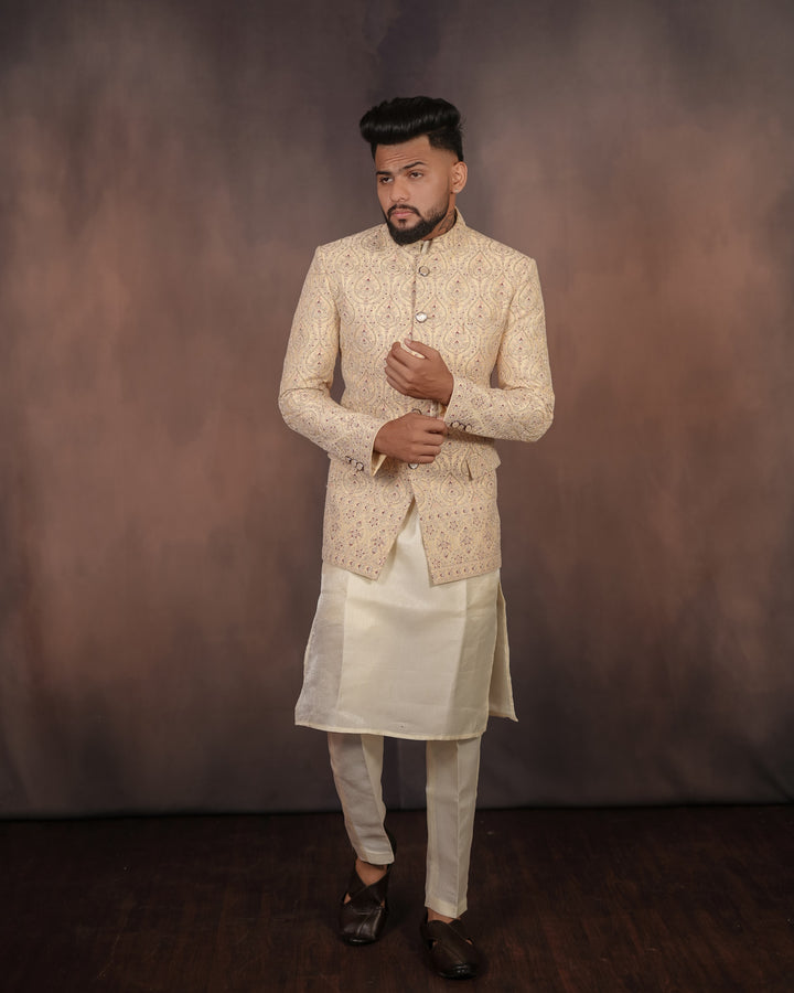 Classic off-white Jodhpuri set featuring intricate embroidery, designed for high-profile events and formal celebrations.