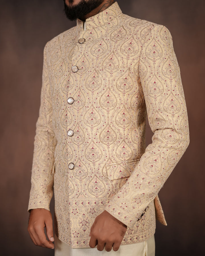 Classic off-white Jodhpuri set featuring intricate embroidery, designed for high-profile events and formal celebrations.