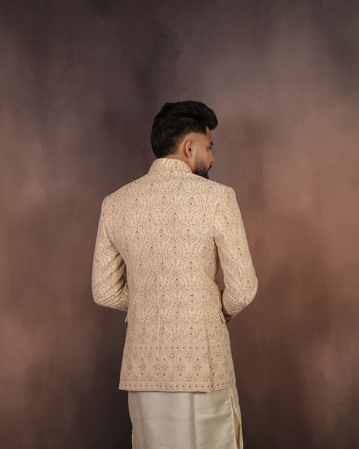 Classic off-white Jodhpuri set featuring intricate embroidery, designed for high-profile events and formal celebrations.