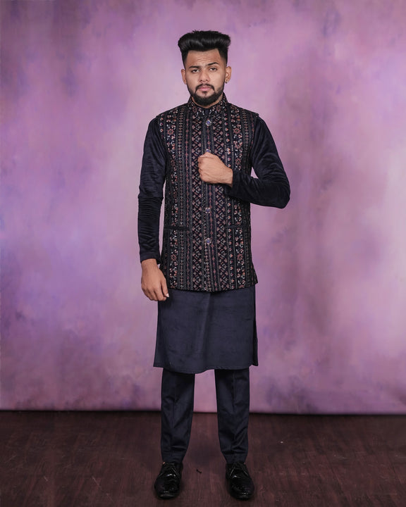 An exquisite navy blue jacket ensemble featuring detailed embroidery work and coordinating trousers.