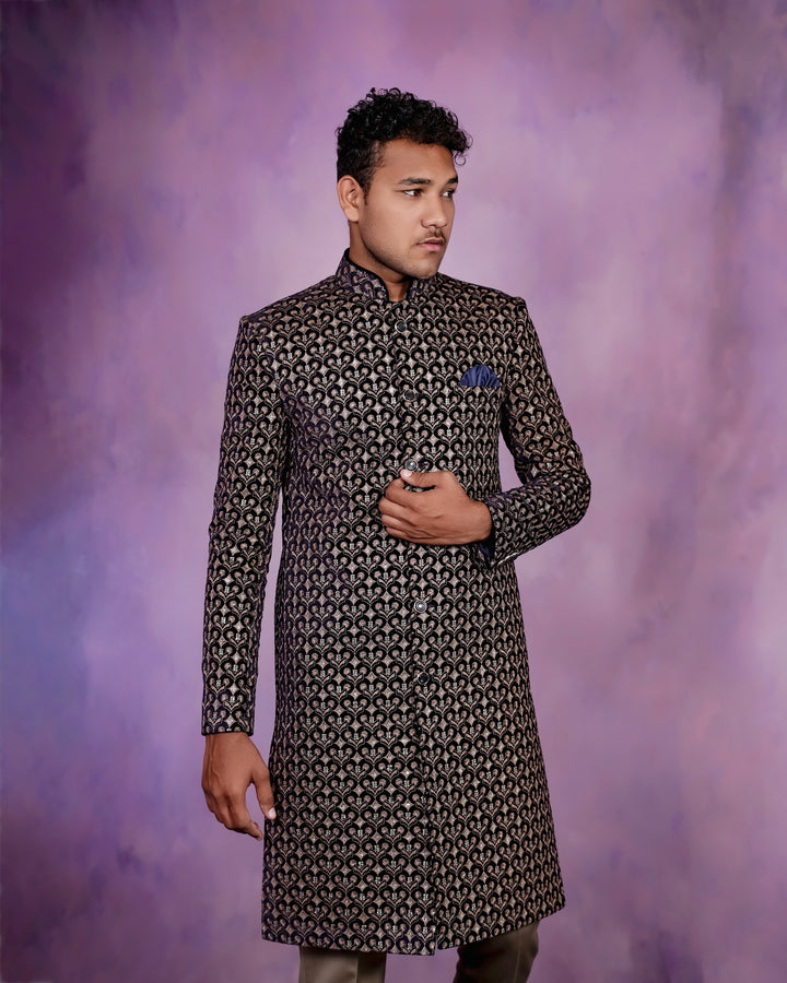 A charming navy velvet Indo-Western ensemble featuring detailed embroidery.